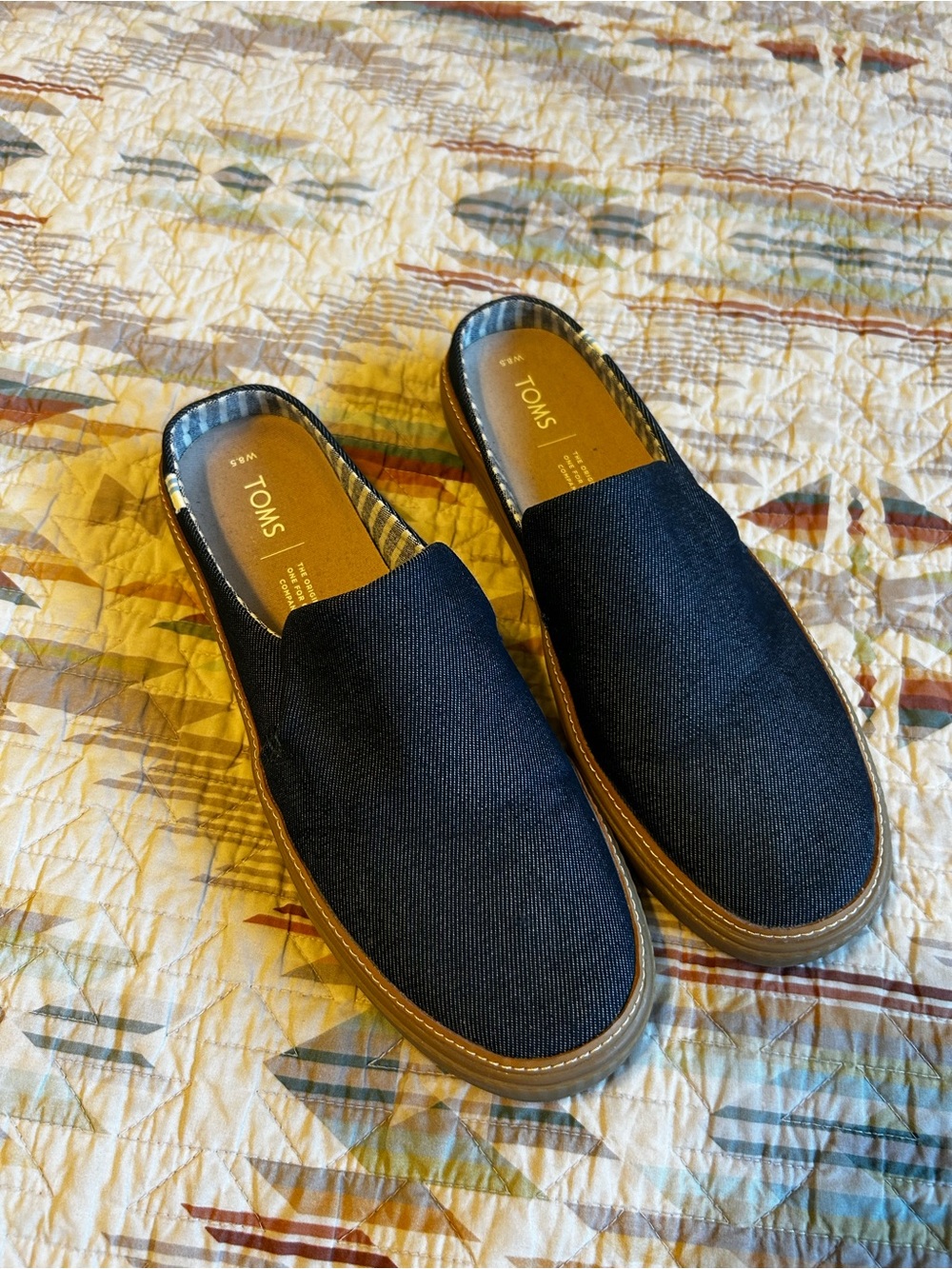 TOMS women’s Navy Canvas Slip-On Loafers with Brown Trim